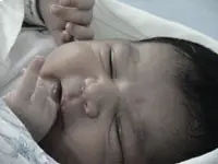 Baby Girl Thinking while sleeping